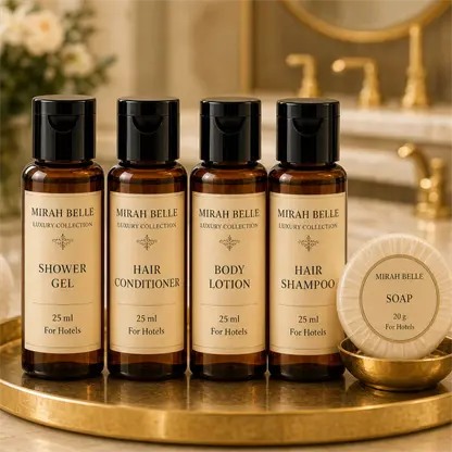 Mirah Belle 25 ml shower gel, hair conditioner, body lotion and hair shampoo bottles with a 20 g guest soap on a gold hotel tray